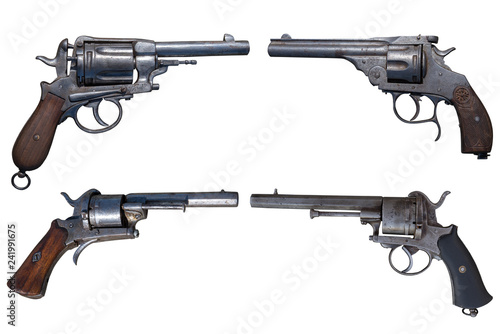 Fototapeta Four antique revolvers isolated on white background.