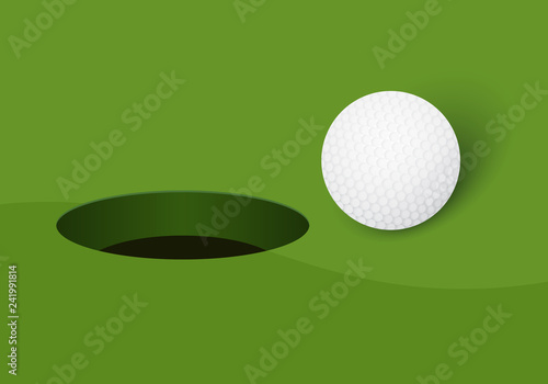 Golf ball and golf hole on green background.