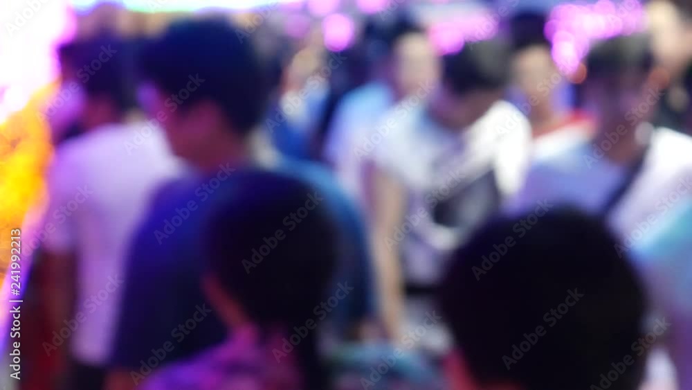 Asian crowd walking through Christmas and New Year light decoration Asian crowd walking through Christmas and New Year light decoration