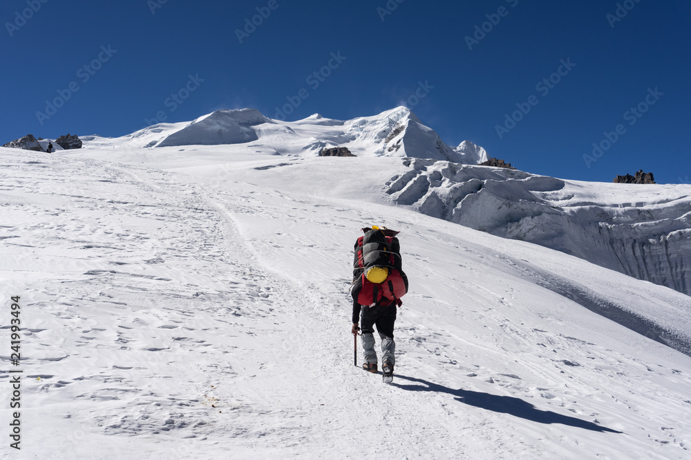 Porter walk to Mera peak high camp on Mera la glacier, Everest region, Nepal