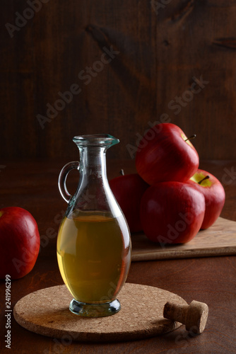 Fototapeta Naklejka Na Ścianę i Meble -  closeup apple cider vinegar on cork mat