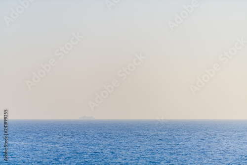 Ocean, sky and lonely ship. Creative sketches. Tenerife. Canary Islands..Spain