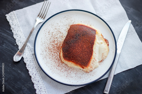 Traditional Turkish dessert Kazandibi with ground cinnamon photo