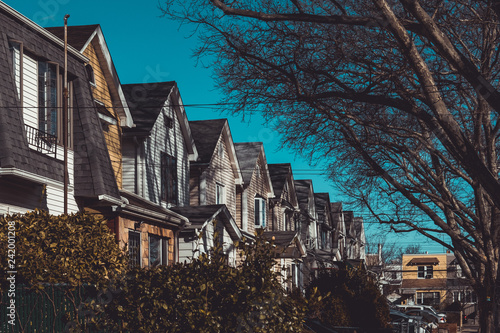 Fotografi Row of colorful residential houses in Queens, NY