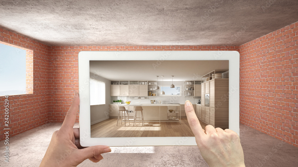 Augmented reality concept. Hand holding tablet with AR application used ...