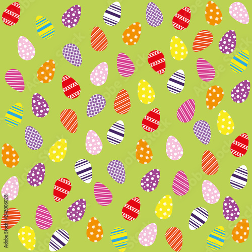seamless background of easter eggs on green