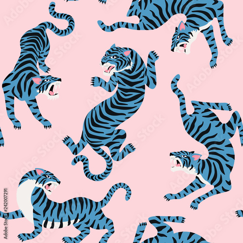 Vector seamless pattern with cute tigers on background. Circus animal show. Fashionable fabric design.