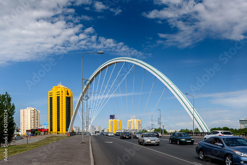 Arch of the bridge across the Ishim river in Astana © podgorakz