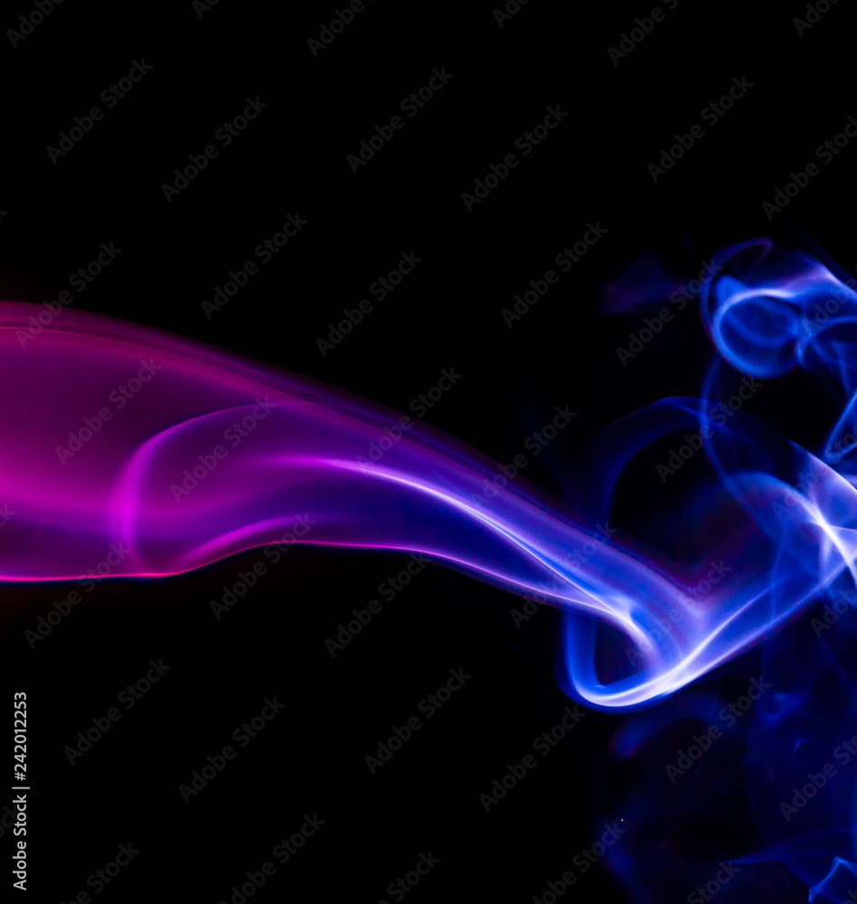Colored smoke on black background Colored smoke on black background