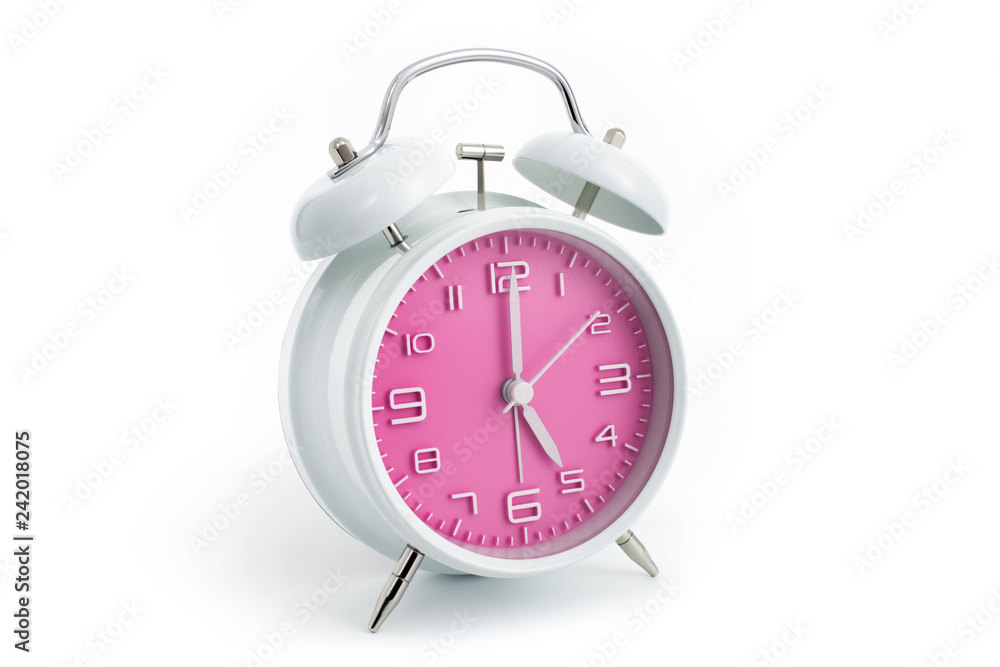 Twin bells analogue alarm clock with pink clock face shows five hours, 5 AM PM; concept on white