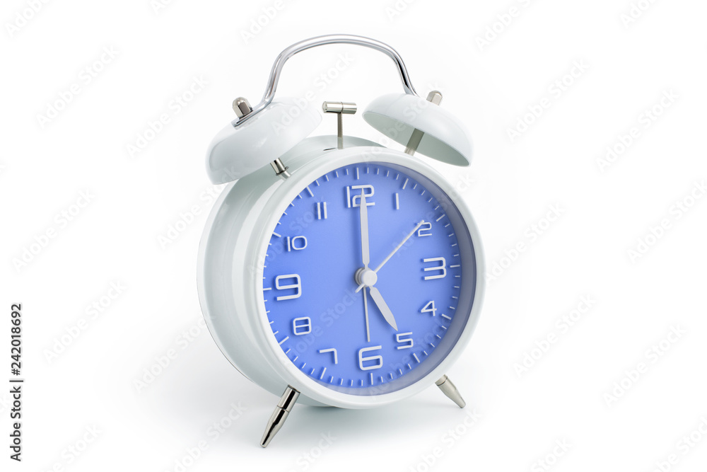 Twin bells analogue alarm clock with blue clock face shows five hours, 5 AM PM; concept on white background Twin bells analogue alarm clock with blue clock face shows five hours, 5 AM PM; concept on white background