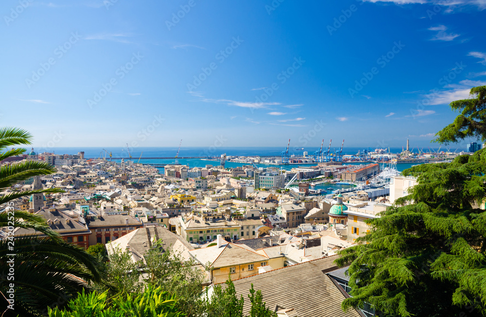 Top aerial scenic panoramic view from above of old historical centre quarter districts of european city Genoa (Genova), port and harbor of Ligurian and Mediterranean Sea, Liguria, Italy