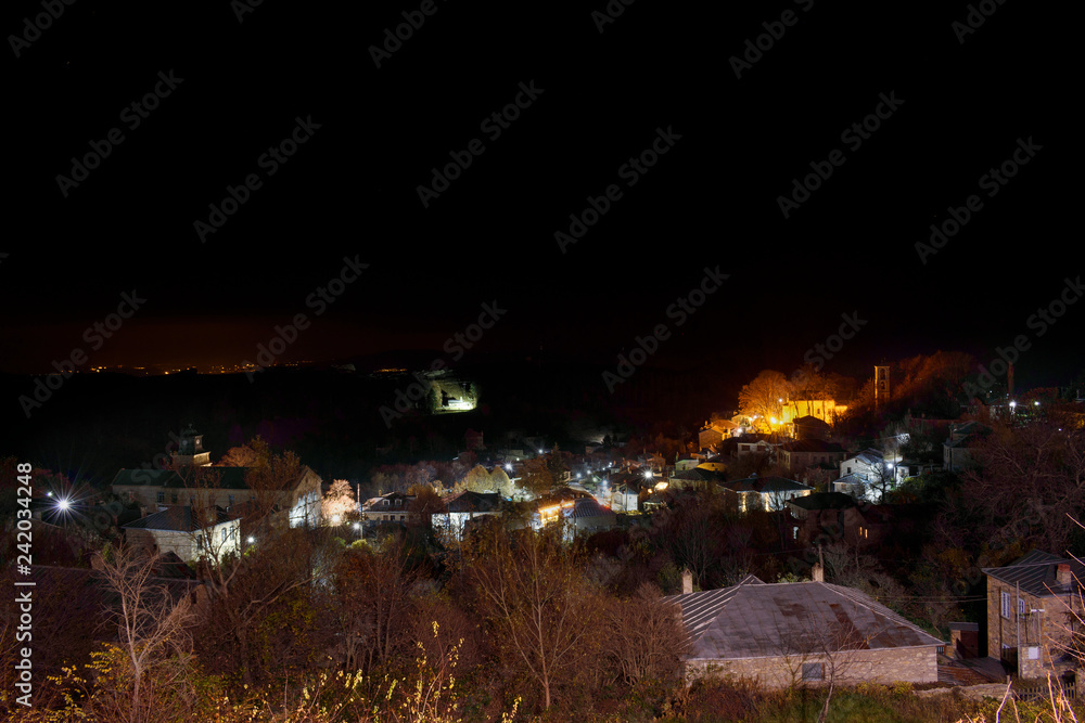 The traditional village of Nymphaio in Macedonia in Greece. Night panoramic photo