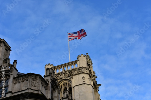 Union Jack, flag of the United Kingdom on a building. London, City of Westminster, Great Britain.