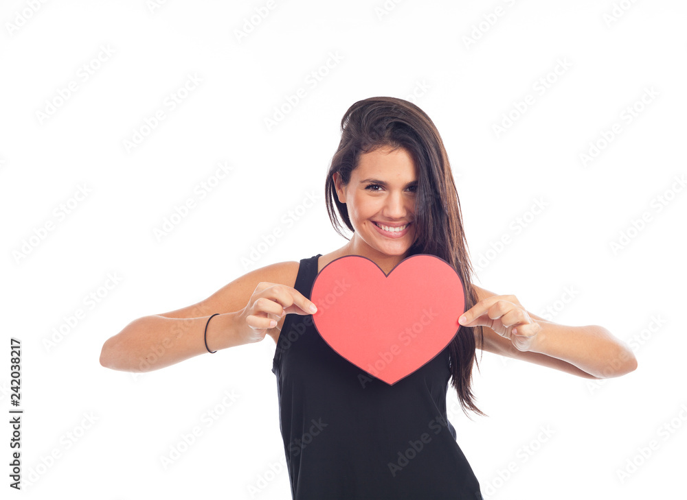 beautiful happy young woman who is holding a big red heart for valentine's day beautiful happy young woman who is holding a big red heart for valentine's day