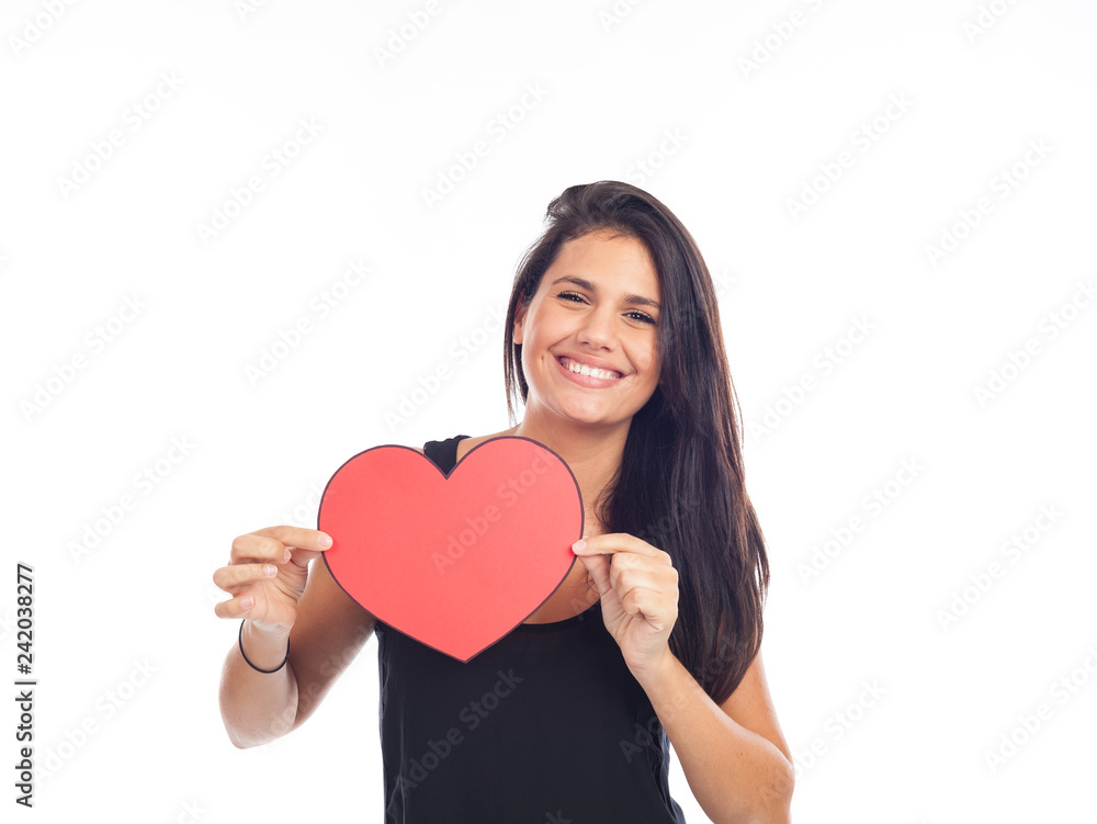 beautiful happy young woman who is holding a big red heart for valentine's day beautiful happy young woman who is holding a big red heart for valentine's day