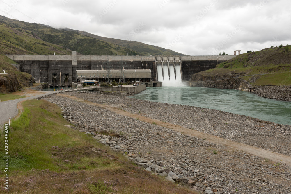 The Clyde hydroelectric power dam spilling large amounts of excess water. Clyde, Otago, New Zealand.