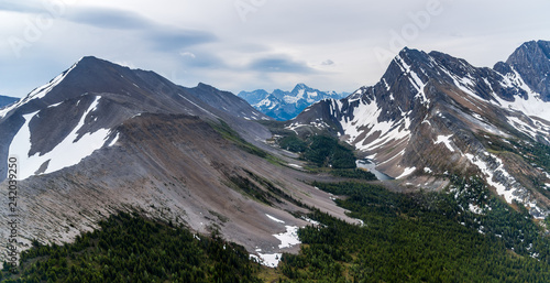 Wedge Mountain aerial and valley views with cloudy sky Canada