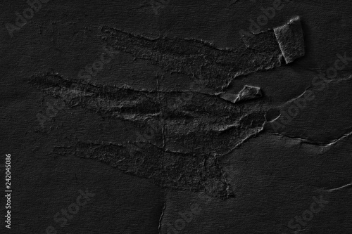 Dark black grey paper background creased crumpled surface old torn ripped posters grunge textures placard backdrop empty space for text