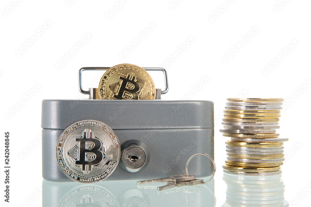 Bitcoins in money box isolated over white background Bitcoins in money box isolated over white background