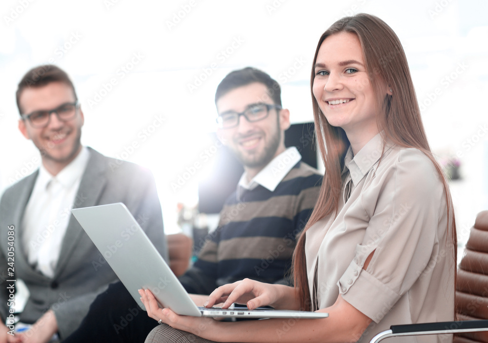 business woman on the background of colleagues business woman on the background of colleagues