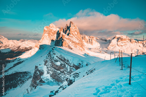 Seceda mountain peaks in the Dolomites at sunset in winter, South Tyrol, Italy photo