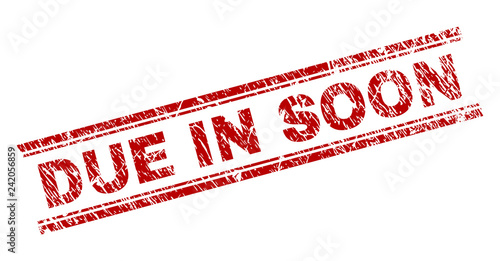 DUE IN SOON seal imprint with corroded texture. Red vector rubber print of DUE IN SOON text with unclean texture. Text title is placed between double parallel lines.
