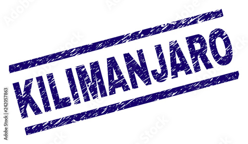 KILIMANJARO seal print with grunge style. Blue vector rubber print of KILIMANJARO caption with dirty texture. Text caption is placed between parallel lines.