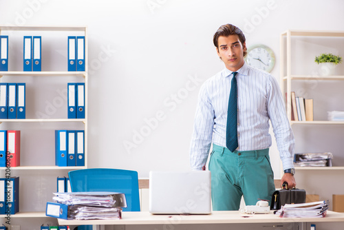 Businessman disgusted with cockroaches in the office
