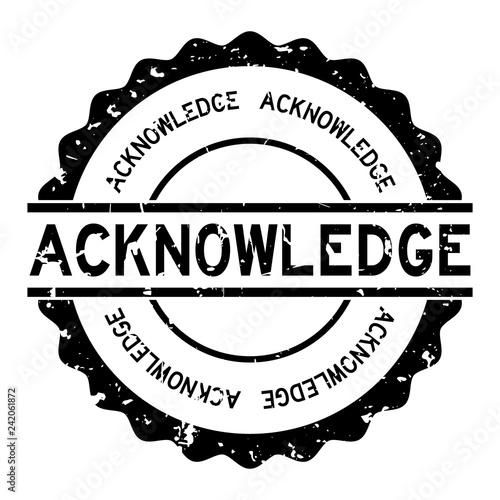 Grunge black acknowledge word round rubber seal stamp on white background