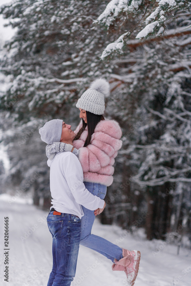 A happy, loving couple.Winter couple photos.Couple in love A happy, loving couple.Winter couple photos.Couple in love