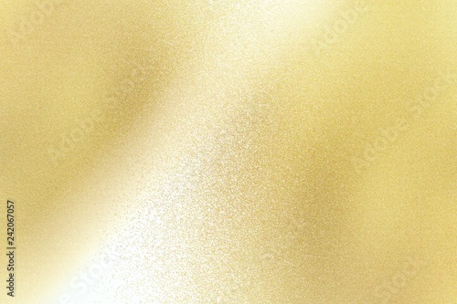 Texture of reflection on gold metallic wall, abstract background