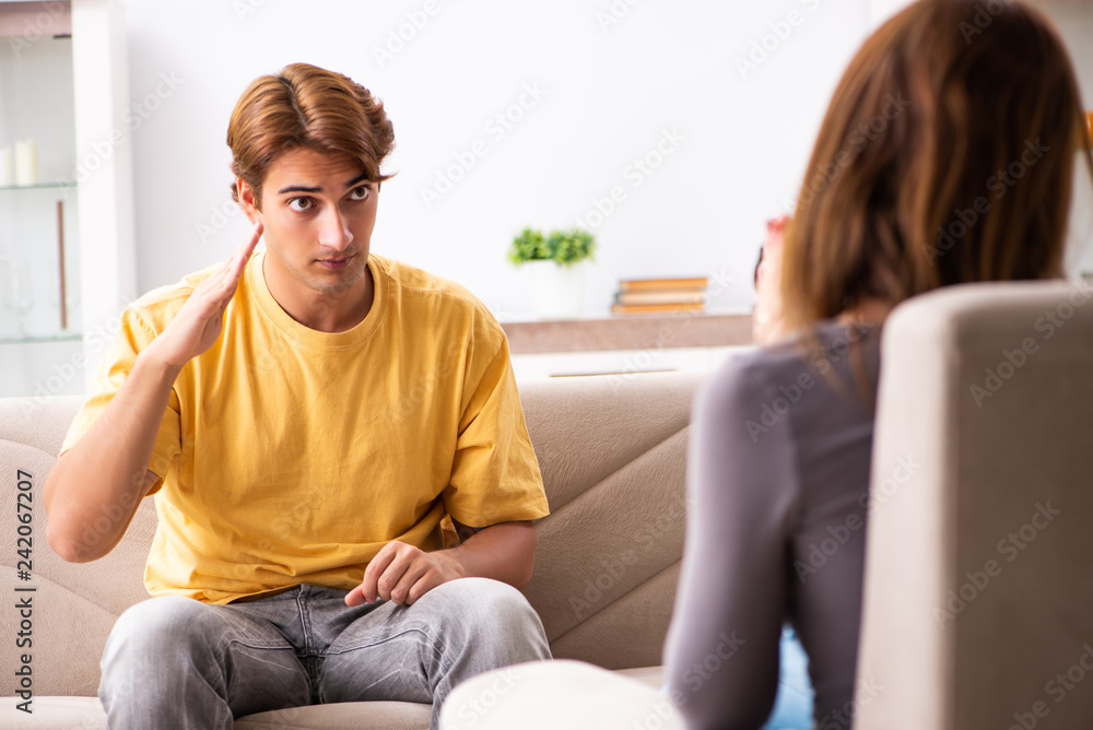 Woman and man learning sign language Woman and man learning sign language