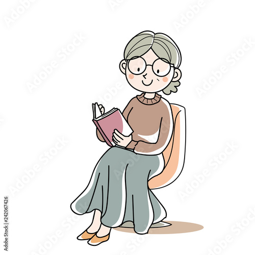 座って本を読む・シニア女性