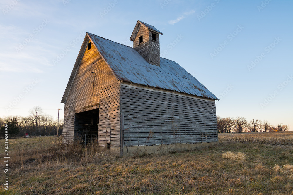 Old wooden barn at sunset. LaSalle County, Illinois, USA Old wooden barn at sunset. LaSalle County, Illinois, USA