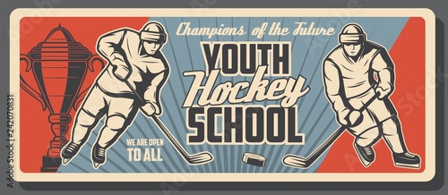 Ice hockey puck, stick and player on rink