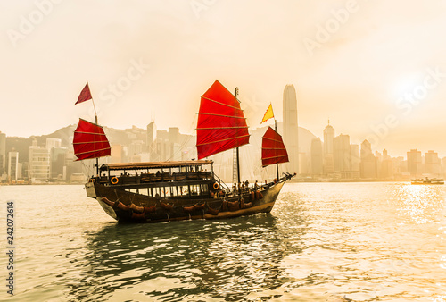 Photography Hong Kong cityscape with tourist junk boat, View from Victoria harbour