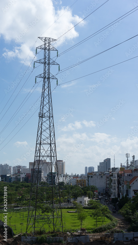 electricity pylon on blue sky and clouds