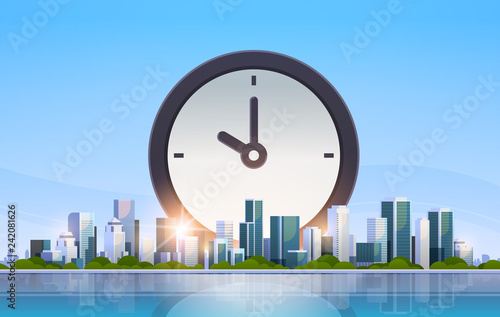 clock icon time management deadline business timing concept over big modern city building skyscraper cityscape skyline flat horizontal