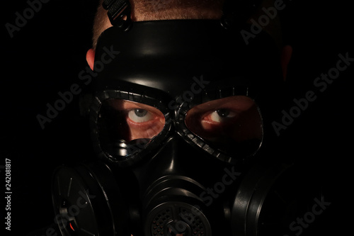 Gas mask on a black background.