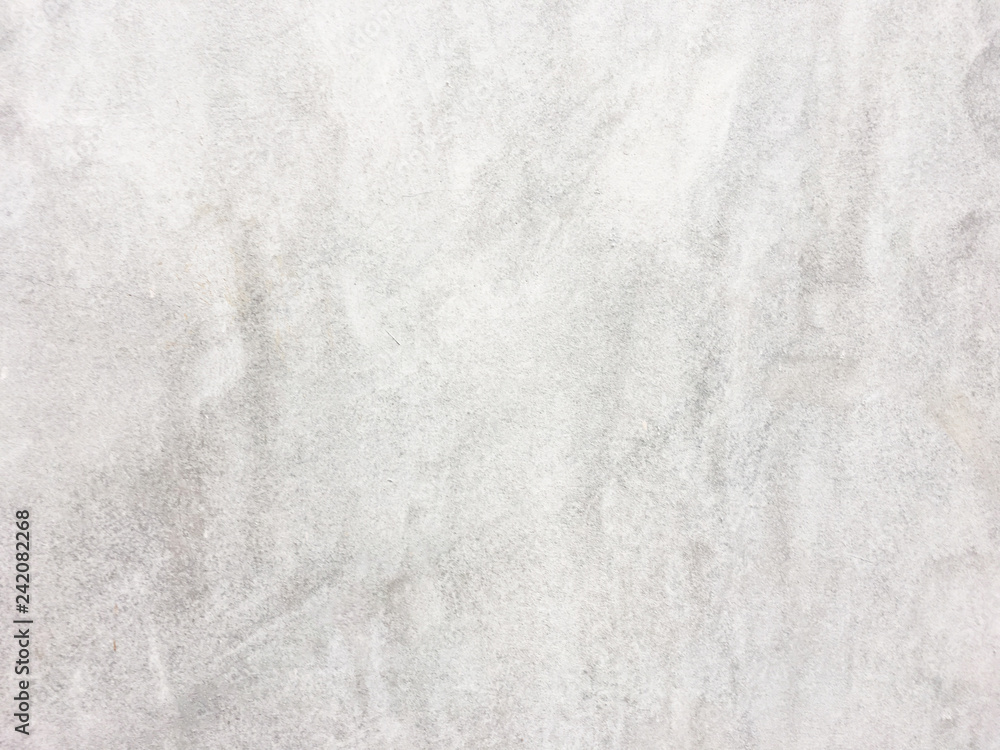 The old cement plaster wall background in black and white The old cement plaster wall background in black and white