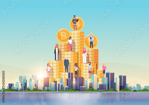 bitcoin virtual money people standing at golden coins stack crypto currency mining concept over big modern city building skyscraper cityscape skyline flat horizontal