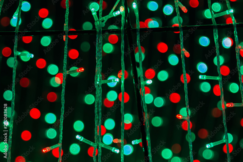 Christmas lights bokeh on transparent background. Xmas glowing garland.  Blurred colorful light, violet, red, green, white in soft fading tone.  Abstract impressive distress wallpaper. Stock Photo | Adobe Stock