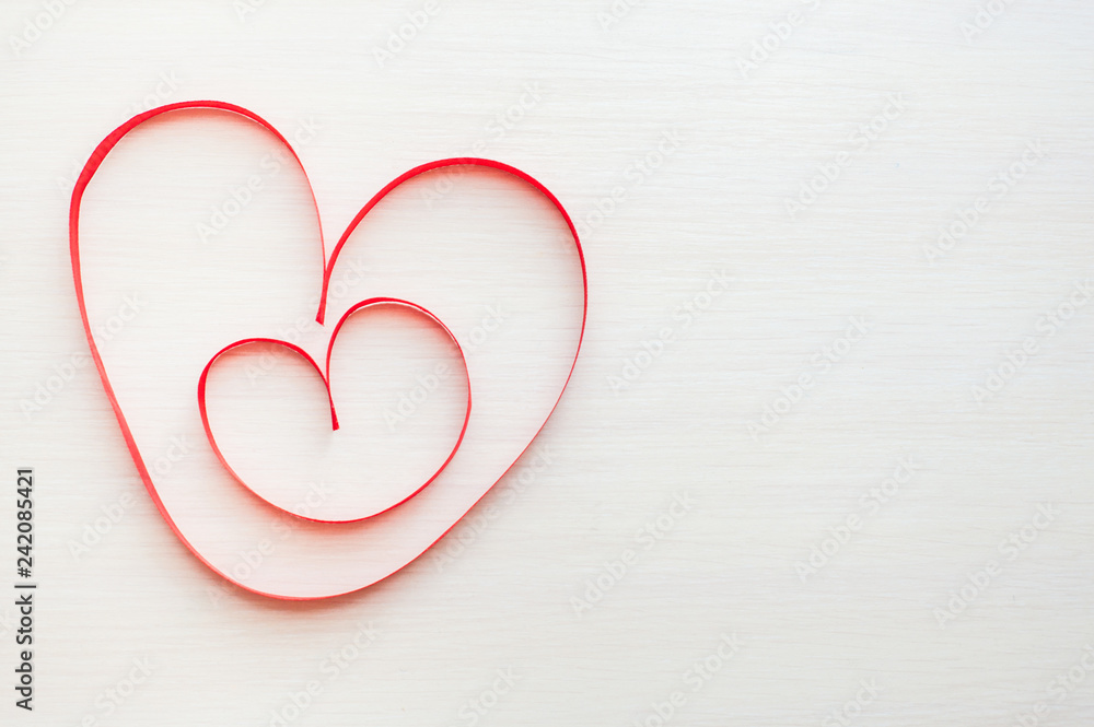 Two red ribbons shaped as heart. Heart in heart Two red ribbons shaped as heart. Heart in heart