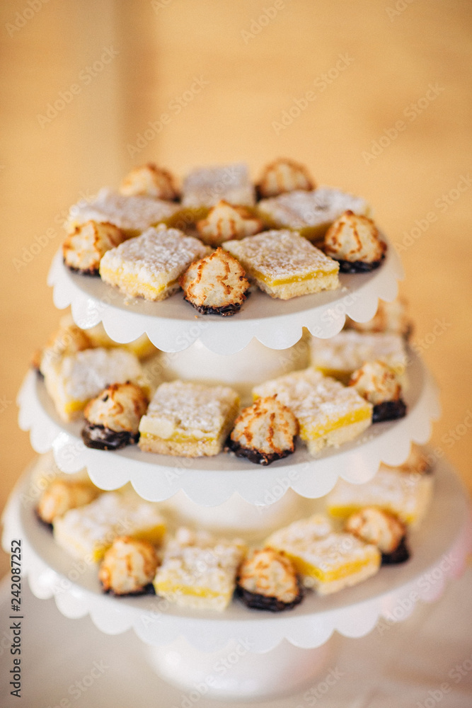 a bunch of desserts sitting on a tray for a wedding a bunch of desserts sitting on a tray for a wedding