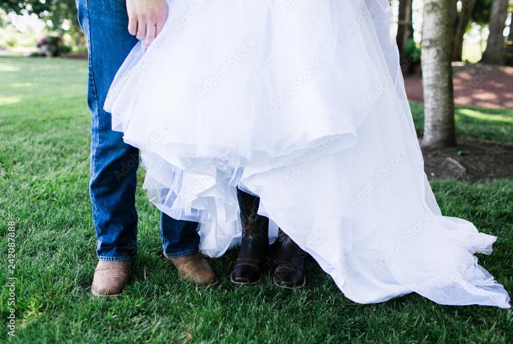 country bride and groom in grass country bride and groom in grass