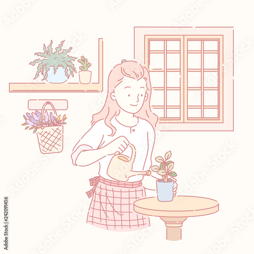 Woman watering a little pot