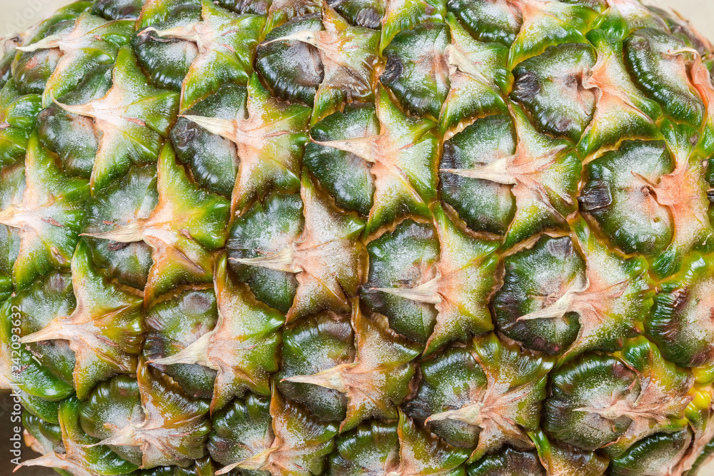 Background of skin of whole pineapple fruit close-up Background of skin of whole pineapple fruit close-up