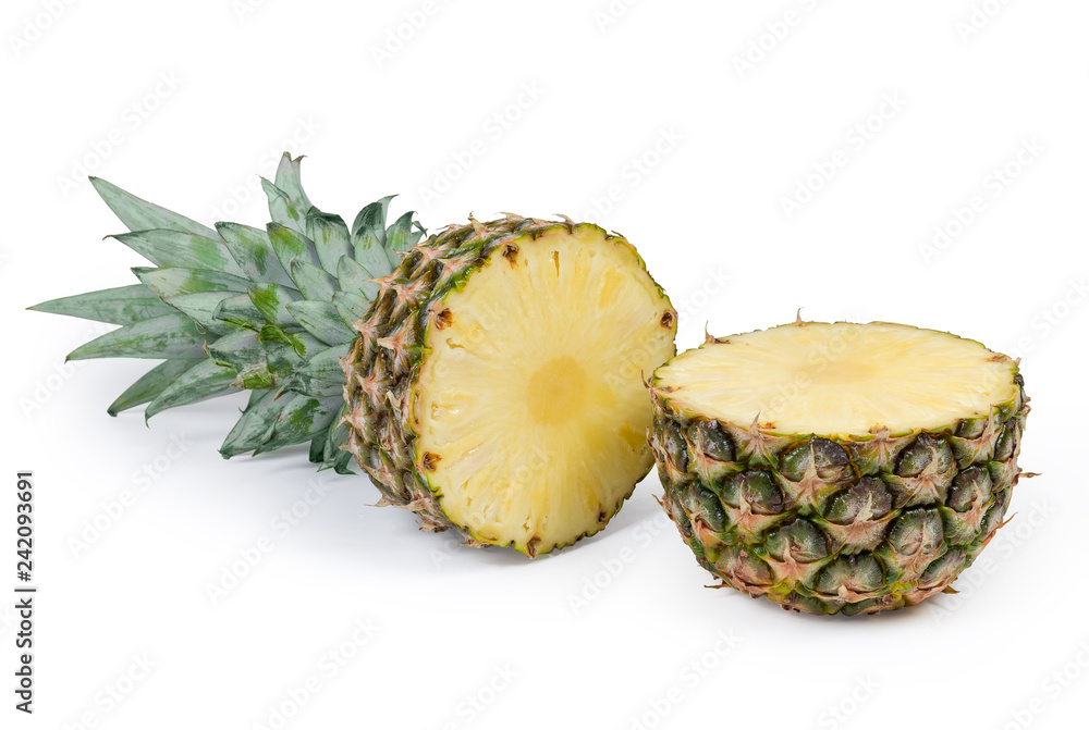 Two halves of fresh pineapple on a white background Two halves of fresh pineapple on a white background