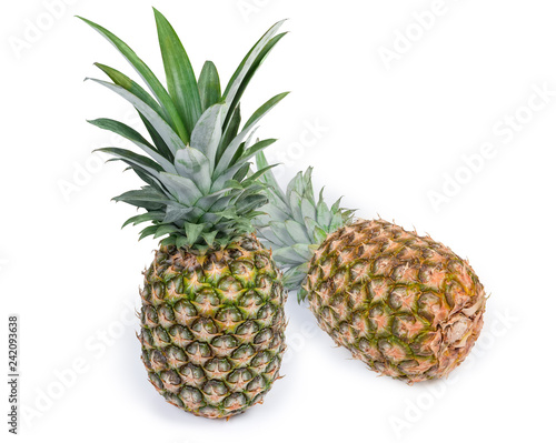 Two whole fresh pineapples on a white background © An-T